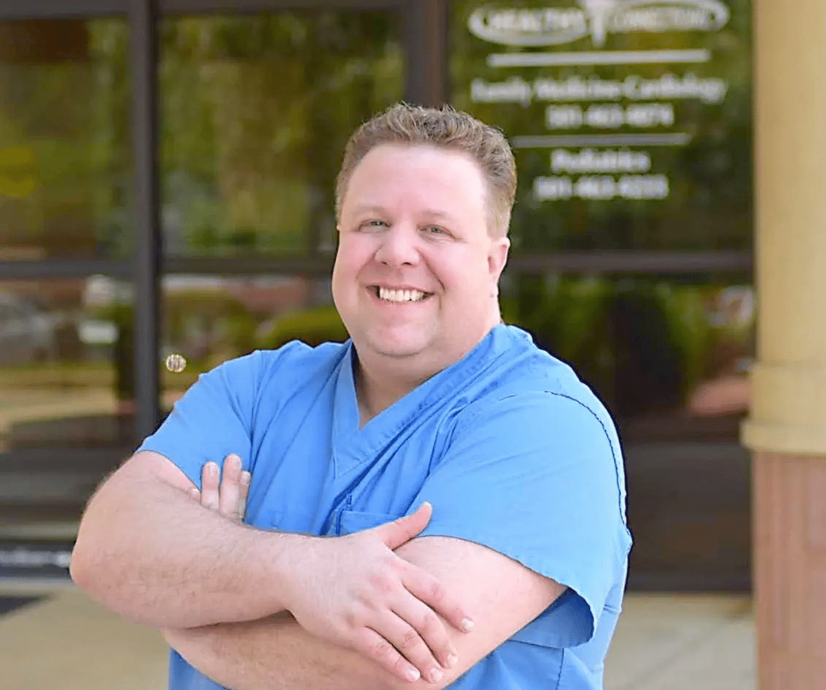 A headshot of Jeremy Porter, MD outside the Healthy Connections clinic.