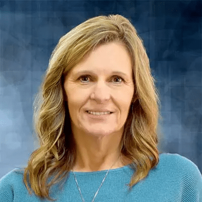 A professional headshot of Angela Martin, APRN, at Healthy Connections.