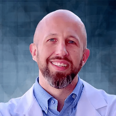 A professional headshot of Clark Roberts, APRN, at Healthy Connections.