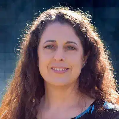 A professional headshot of Leslie Collie, APRN, at Healthy Connections.