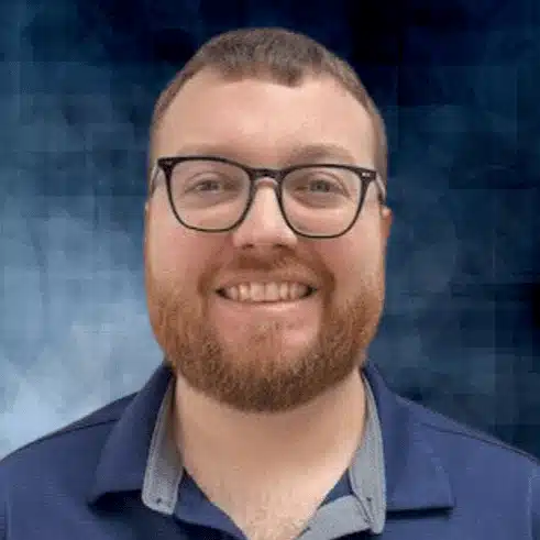 A professional headshot of Kaleb Harp, DDS, at Healthy Connections.