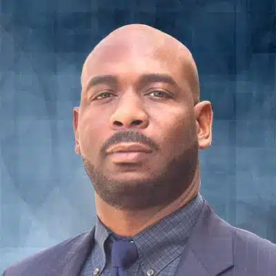 A professional headshot of Eric Luster at Healthy Connections.