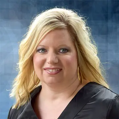 A professional headshot of Briana Newcomb, APRN at Healthy Connections.